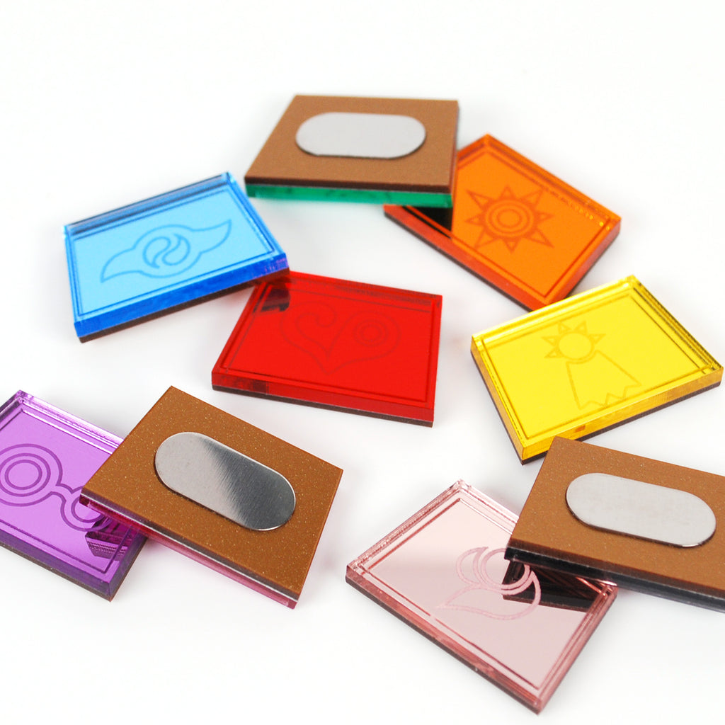 Colorful transparent square blocks with metallic designs on a white background